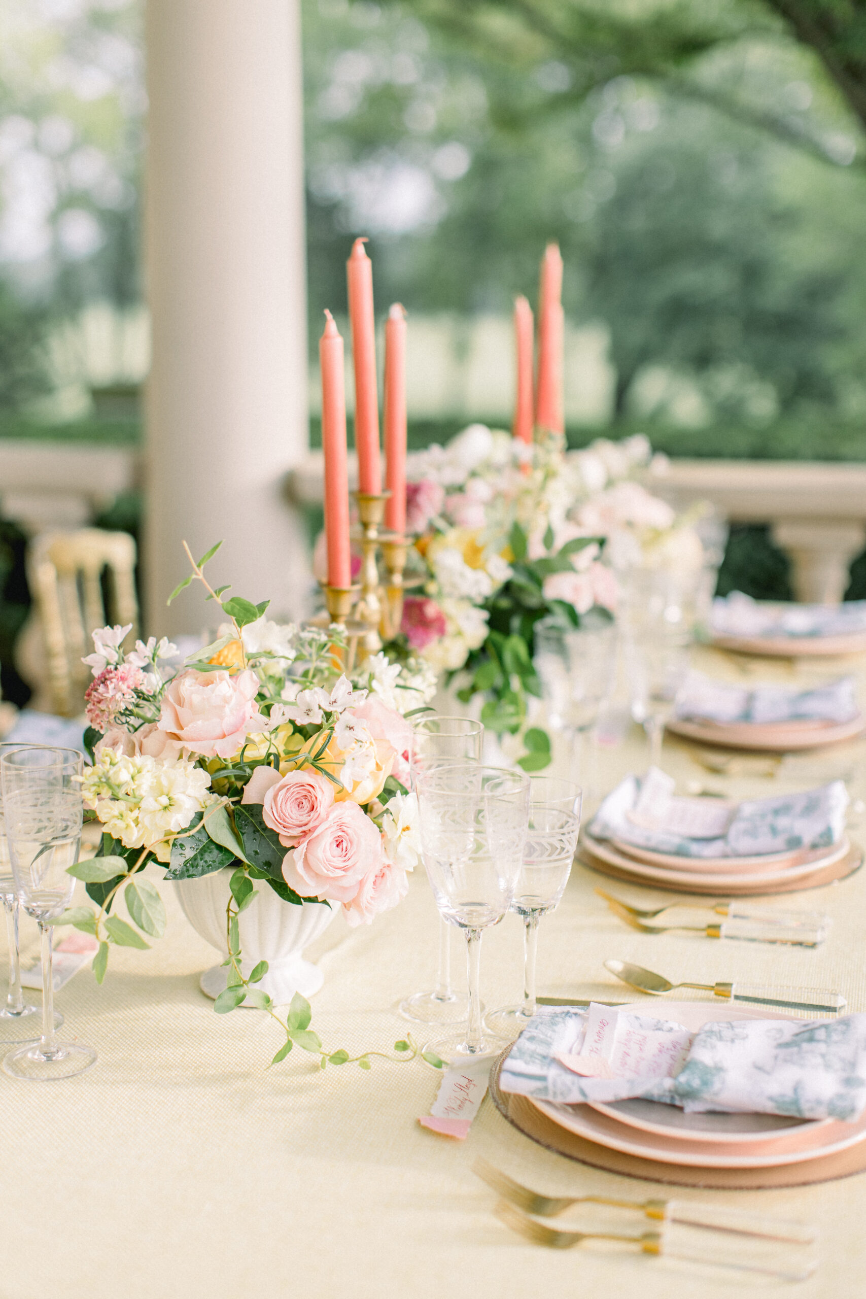 Pink and yellow wedding florals at Great Marsh Estate